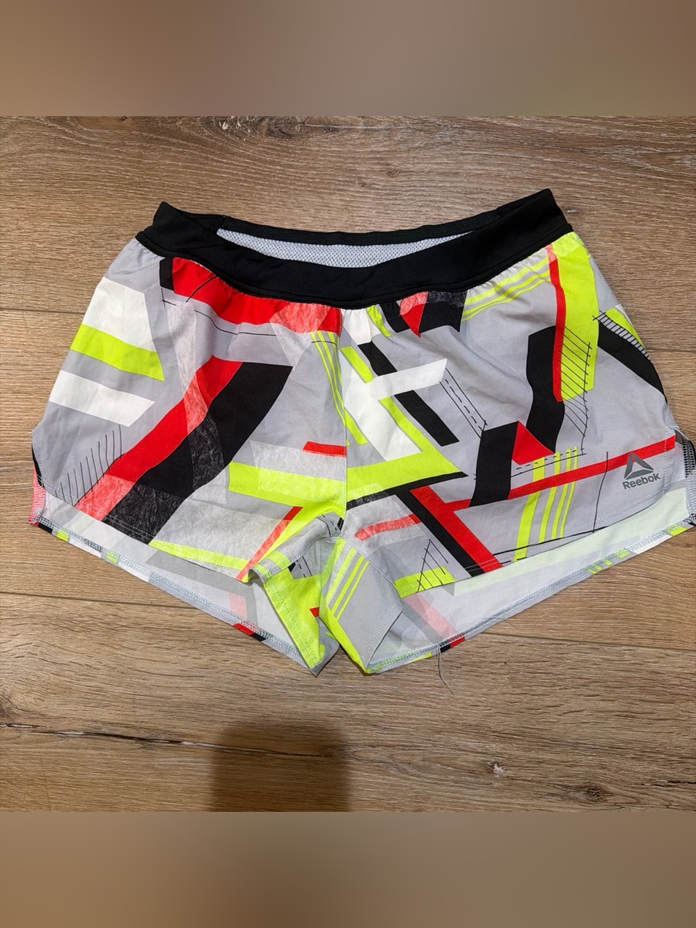 Reebok Women's Neon Geo Print Athletic Shorts - Black Waistband
